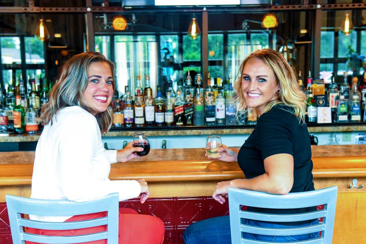 Two women at bar Blue Heron Brew Pub Marshfield WI