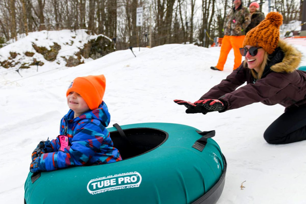 Mother and child tubing at Powers Bluff County Park in central Wisconsin